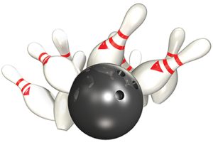 Photo of bowling pins and a bowling ball